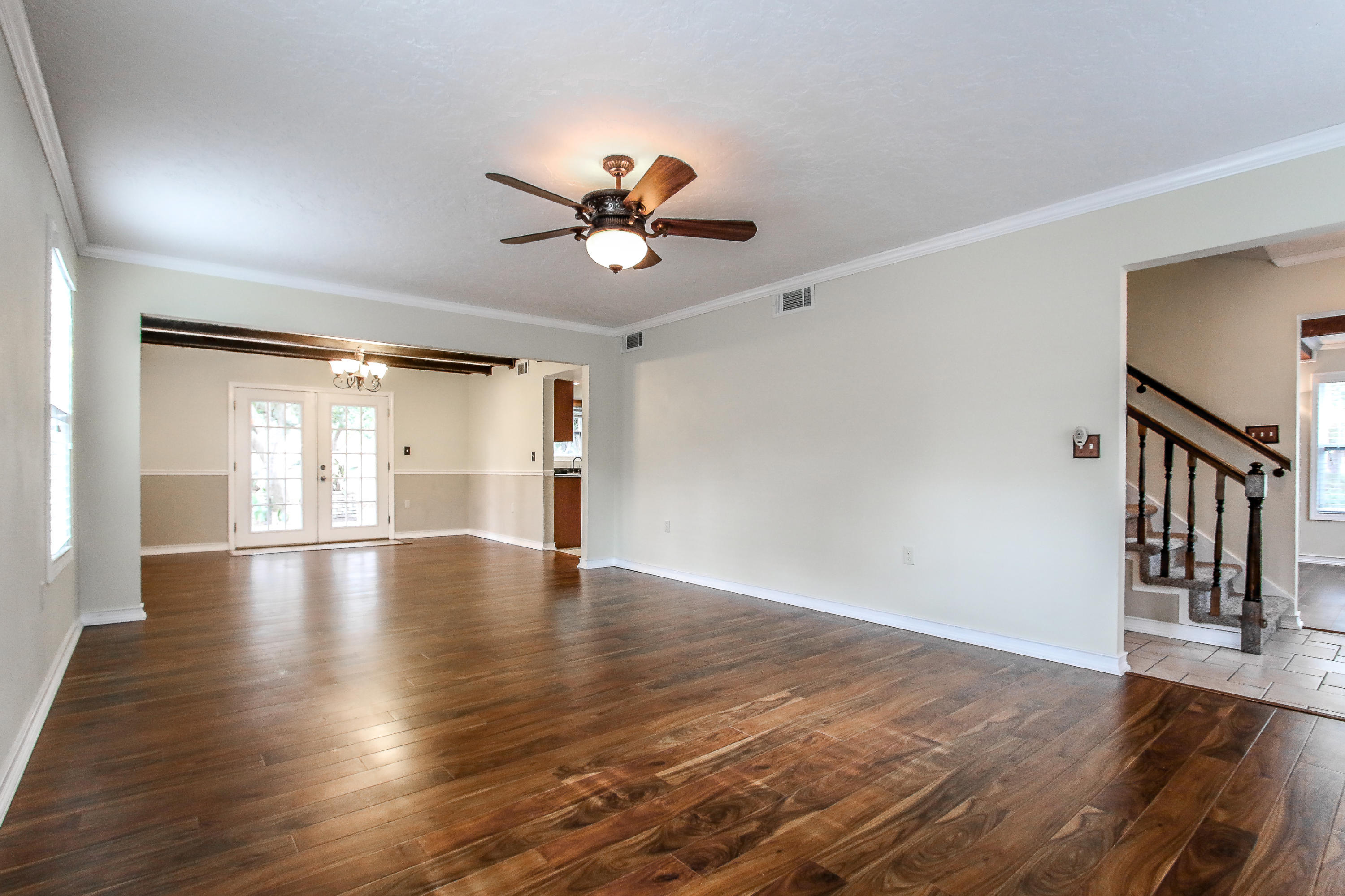 237 Country Club Road Shalimar, FL 32579 - Photo 20 of 74 a view of empty room with wooden floor and fan