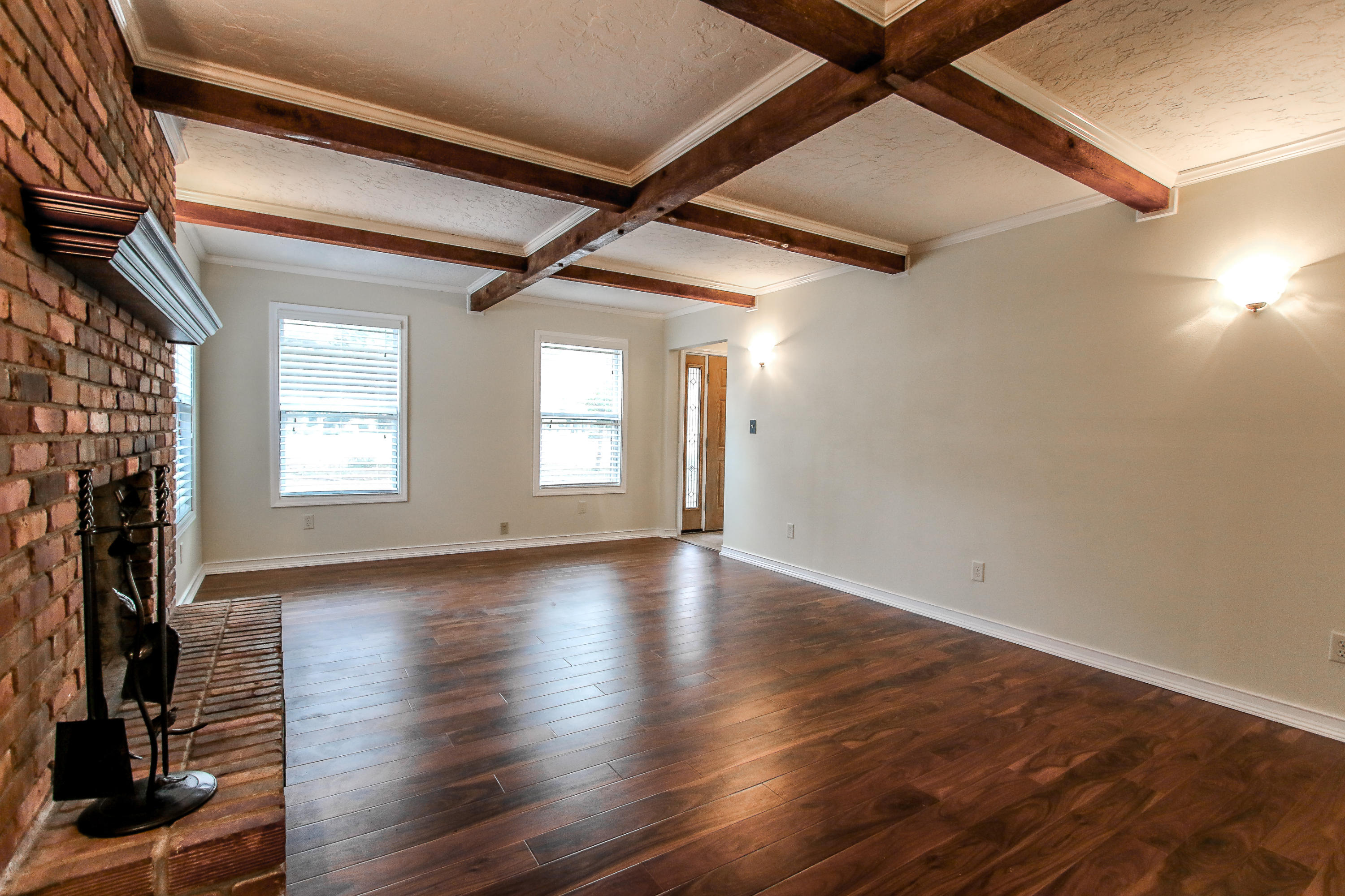 237 Country Club Road Shalimar, FL 32579 - Photo 25 of 74 a view of an empty room with wooden floor and a window