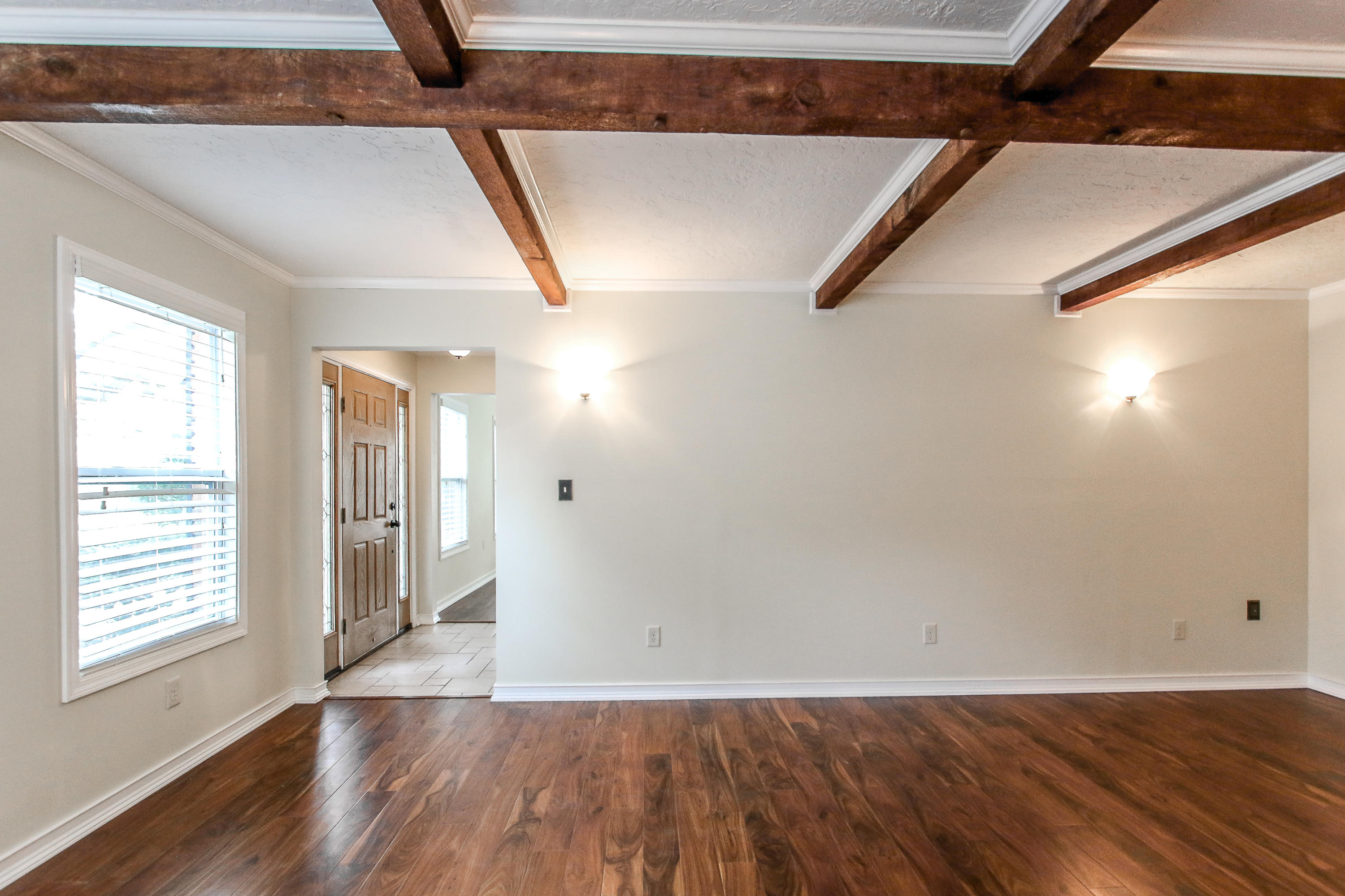 237 Country Club Road Shalimar, FL 32579 - Photo 27 of 74 a view of an empty room with wooden floor and a window