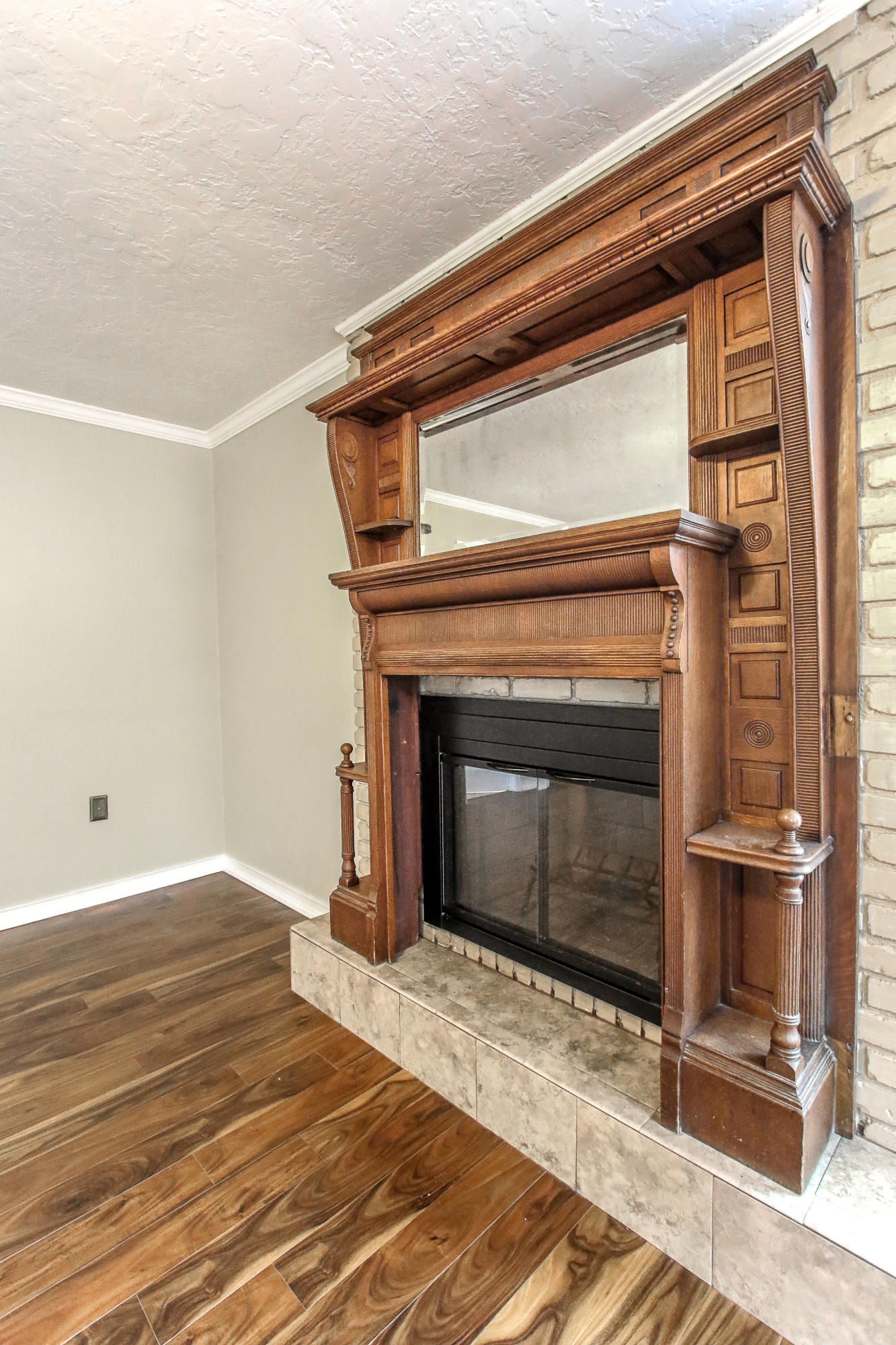 237 Country Club Road Shalimar, FL 32579 - Photo 62 of 74 a bedroom with a bed and a fireplace