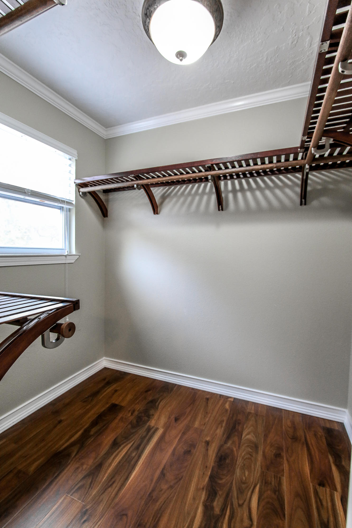 237 Country Club Road Shalimar, FL 32579 - Photo 66 of 74 a view of a room with wooden floor and windows