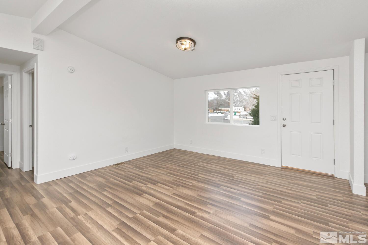 17530 Fantail Street Reno, NV 89508 - Photo 3 of 27 wooden floor in an empty room