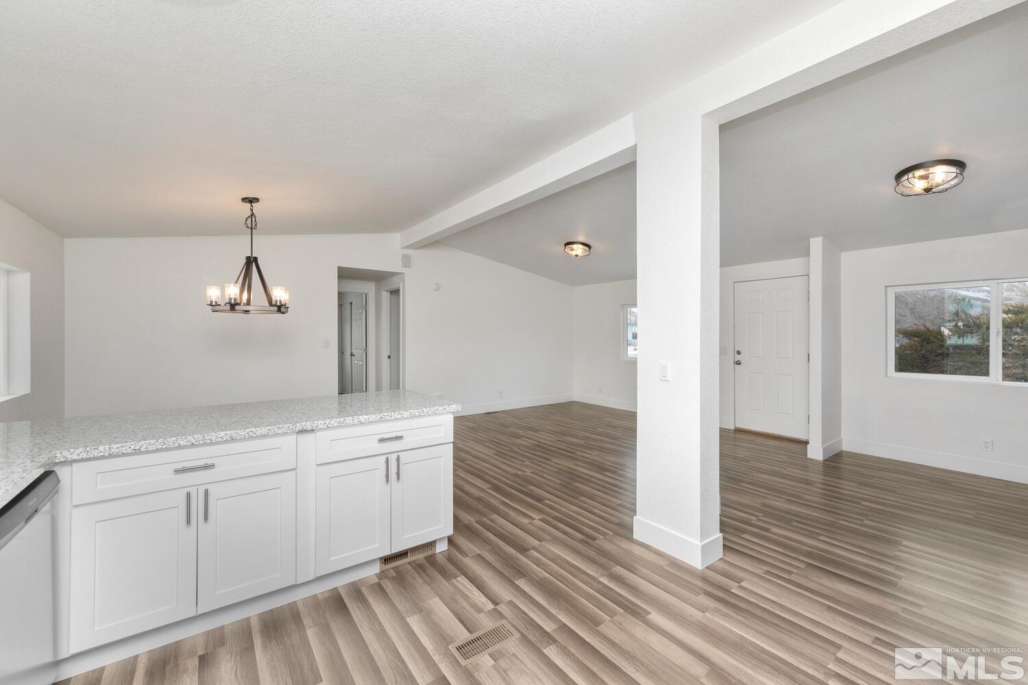 17530 Fantail Street Reno, NV 89508 - Photo 9 of 27 a spacious bathroom with a sink and a mirror