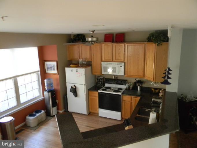623 Trout Run Court Odenton, MD 21113 - Photo 11 of 30 Hardwood flooring and 42" cabinets