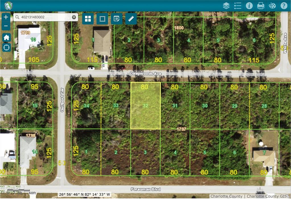 12415 Deepwoods Avenue Port Charlotte, FL 33981 - Photo 3 of 3 swimming pool view with a garden and plants