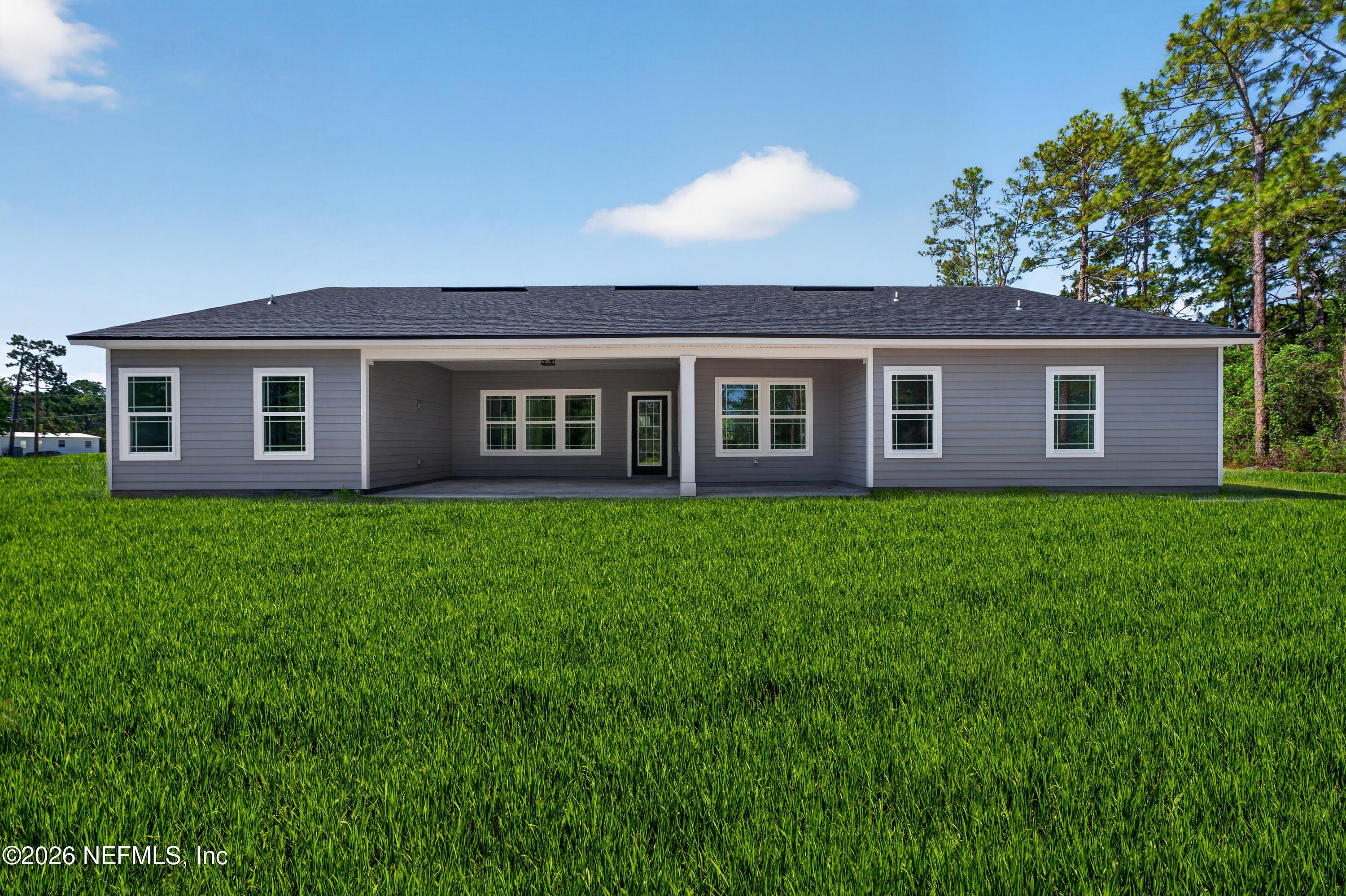 4362 Angora Street Middleburg, FL 32068 - Photo 30 of 31 a house view with a garden space