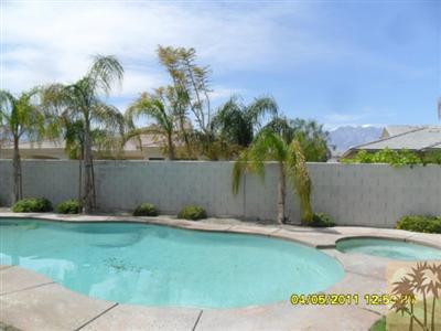 23 Napoleon Road Rancho Mirage, CA 92270 - Photo 2 of 7 a backyard of a house with lots of green space