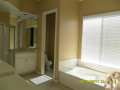 23 Napoleon Road Rancho Mirage, CA 92270 - Photo 6 of 7 a bathroom with a tub and a sink