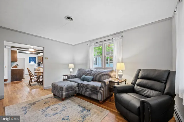 a living room with furniture and a couch