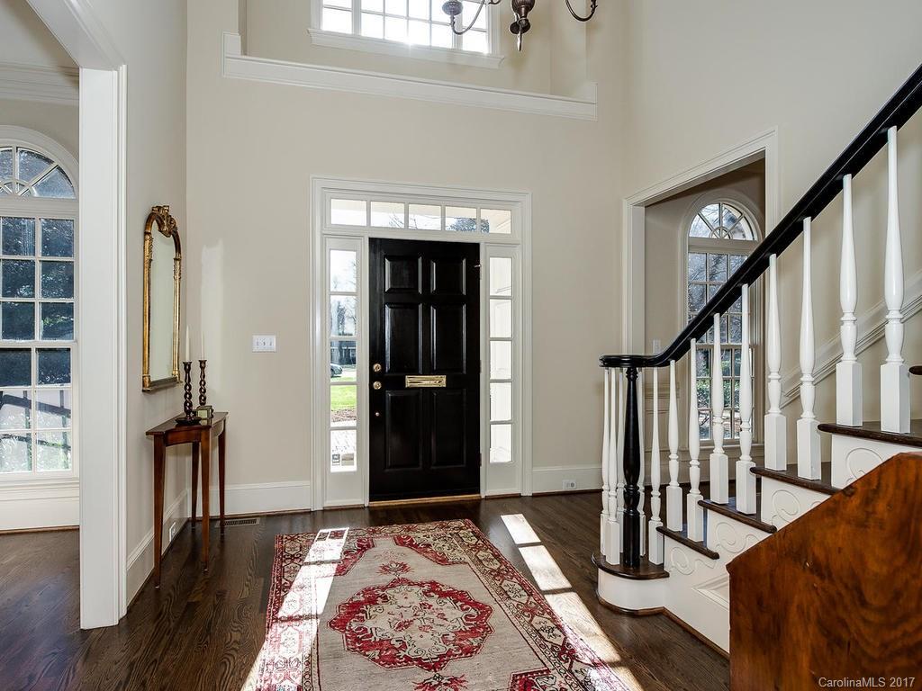 1900 Harris Road Charlotte, NC 28211 - Photo 2 of 24 a view of an entryway with wooden floor and windows