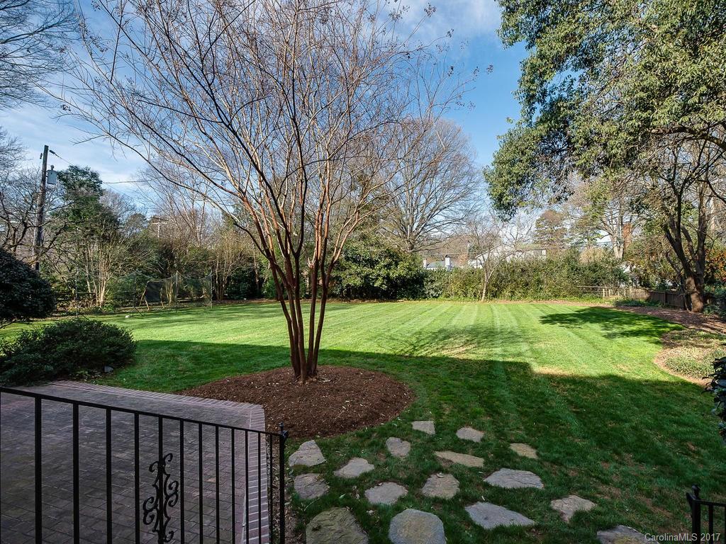 1900 Harris Road Charlotte, NC 28211 - Photo 22 of 24 a view of a backyard with large trees