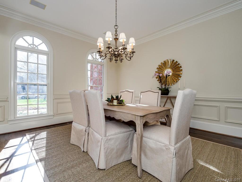 1900 Harris Road Charlotte, NC 28211 - Photo 4 of 24 a dining room with furniture a chandelier and window