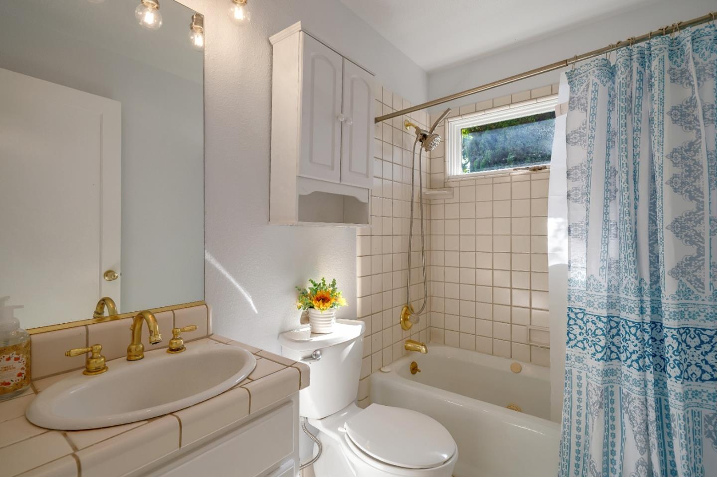 40 Bloomfield Road Burlingame, CA 94010 - Photo 36 of 45 a bathroom with a sink toilet and shower