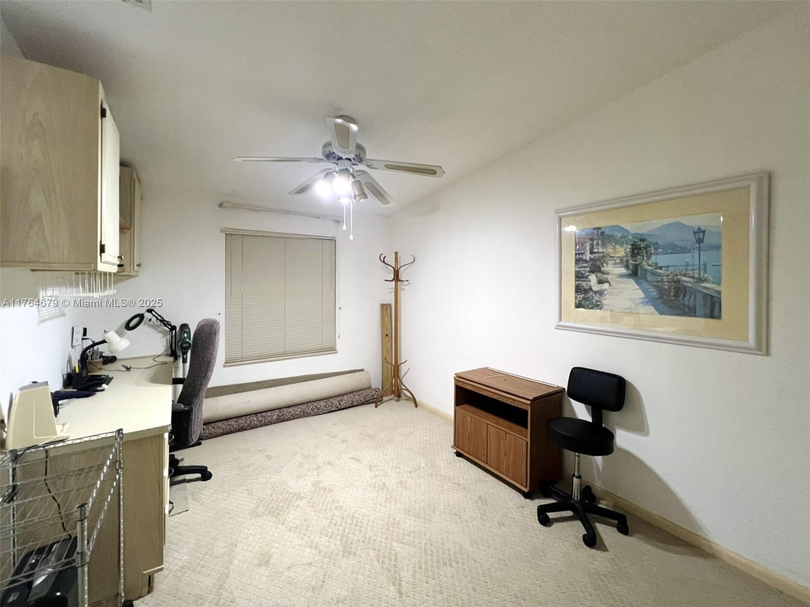 6367 Southwest 83rd Place Ocala, FL 34476 - Photo 16 of 47 a view of workspace with lounge chair