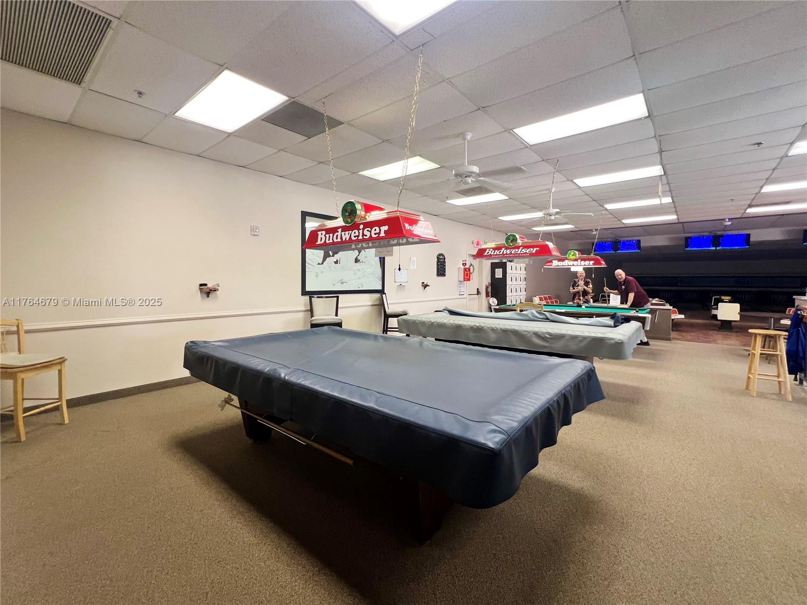 6367 Southwest 83rd Place Ocala, FL 34476 - Photo 39 of 47 a kitchen with stainless steel appliances dining table and chairs