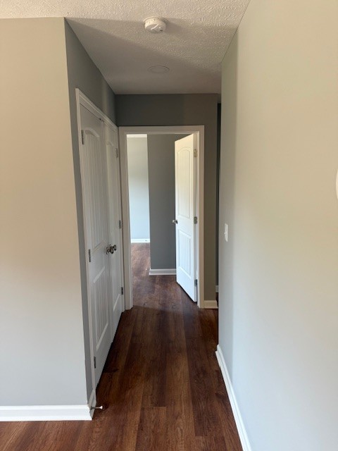 159 Hesselly Road Decherd, TN 37324 - Photo 8 of 12 a view of a hallway with wooden floor
