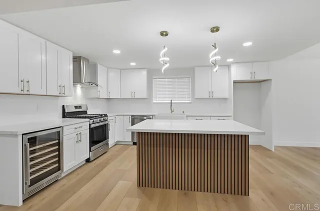 a view of a house with backyard and a sitting area