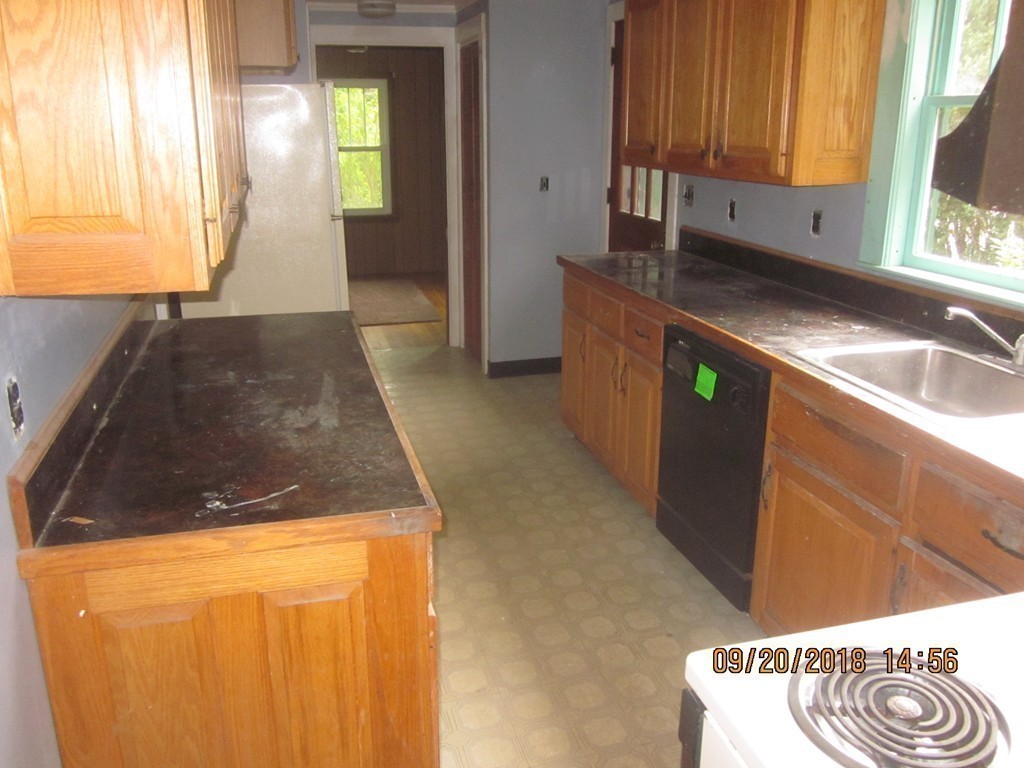 26 Waterhouse Road Bourne, MA 02532 - Photo 12 of 28 a kitchen with a sink and a window