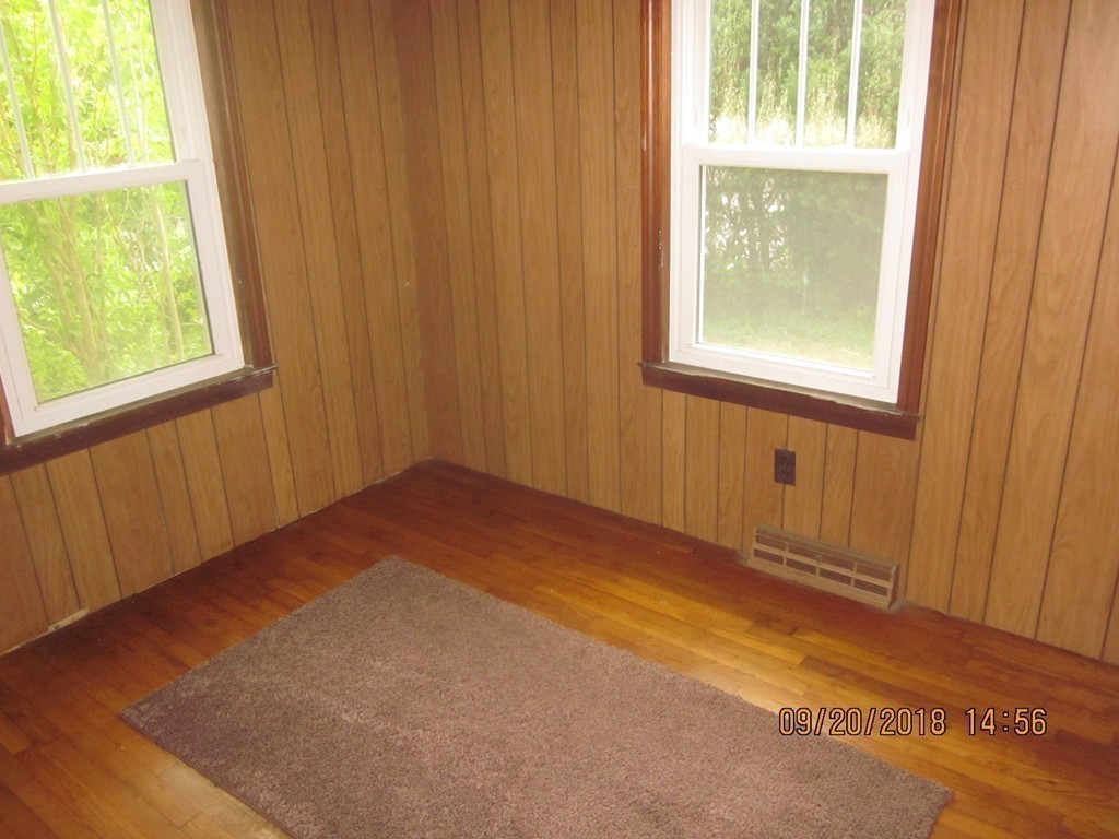 26 Waterhouse Road Bourne, MA 02532 - Photo 16 of 28 a view of an empty room and window