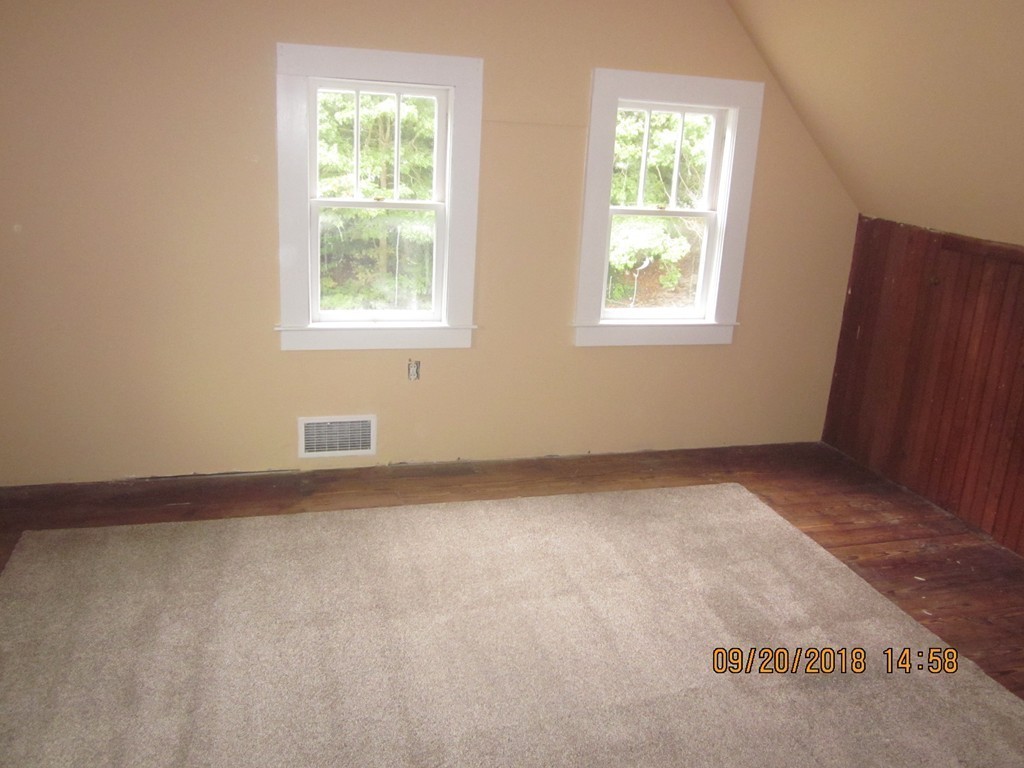 26 Waterhouse Road Bourne, MA 02532 - Photo 17 of 28 an empty room with windows