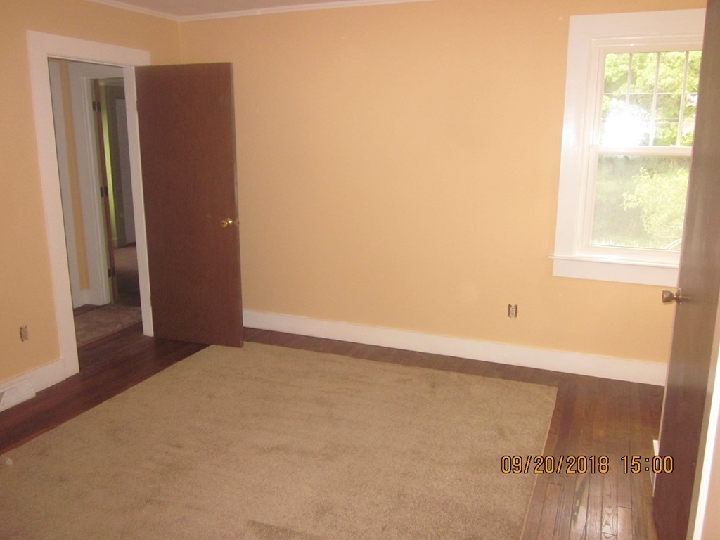26 Waterhouse Road Bourne, MA 02532 - Photo 25 of 28 a view of an empty room with a window