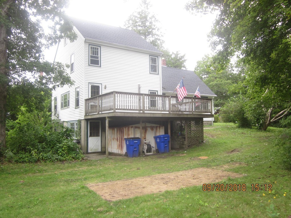 26 Waterhouse Road Bourne, MA 02532 - Photo 3 of 28 a front view of a house with garden
