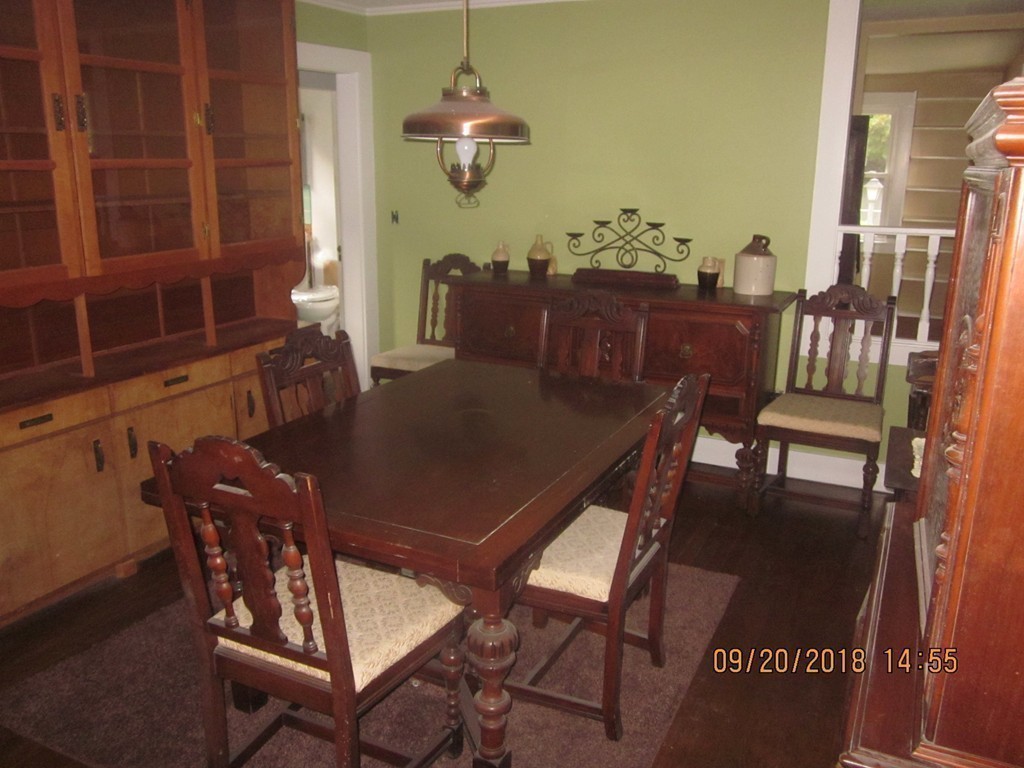 26 Waterhouse Road Bourne, MA 02532 - Photo 9 of 28 a view of a dining room with furniture and chandelier
