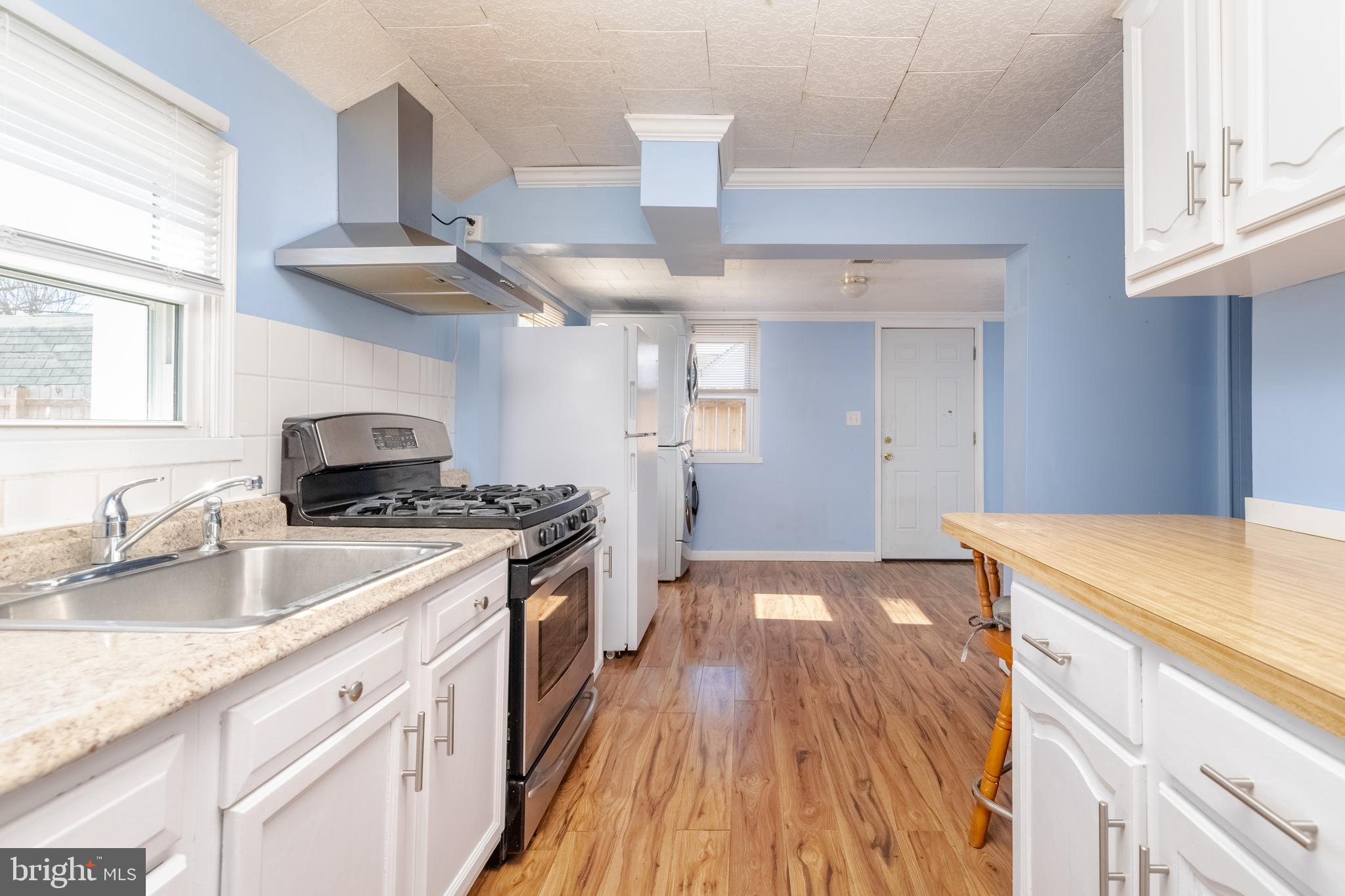 3171 Baybriar Road Dundalk, MD 21222 - Photo 26 of 41 a kitchen with a sink and a stove top oven