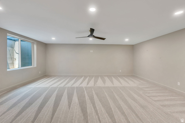 250 South Main Street, Unit 10 Alpine, UT 84004 - Photo 22 of 29 Spacious room featuring carpeting, recessed lighting, a contemporary ceiling fan, and a large window