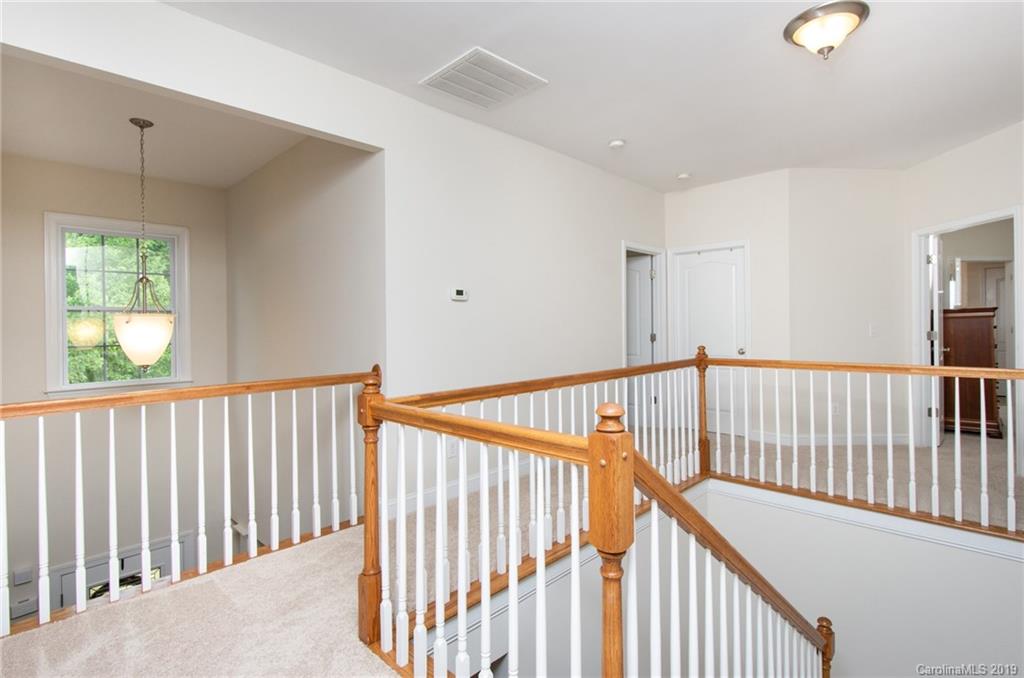 538 Quicksilver Trail Fort Mill, SC 29708 - Photo 16 of 39 a view of staircase with rug floor