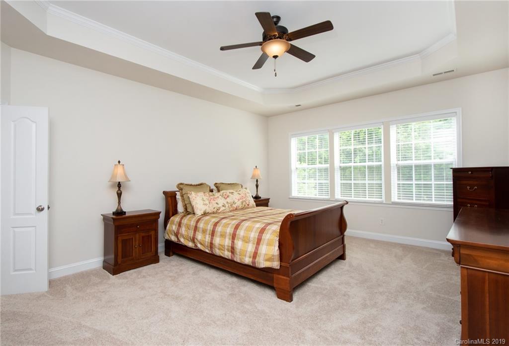 538 Quicksilver Trail Fort Mill, SC 29708 - Photo 18 of 39 a bed sitting in a room next to a window