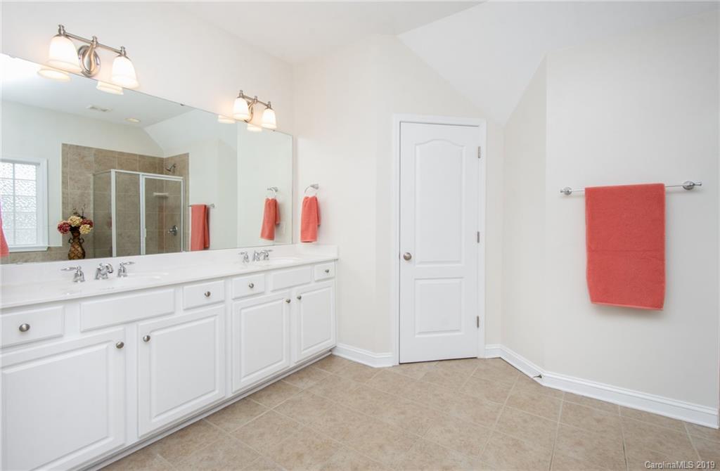 538 Quicksilver Trail Fort Mill, SC 29708 - Photo 21 of 39 a bathroom with a sink and a mirror