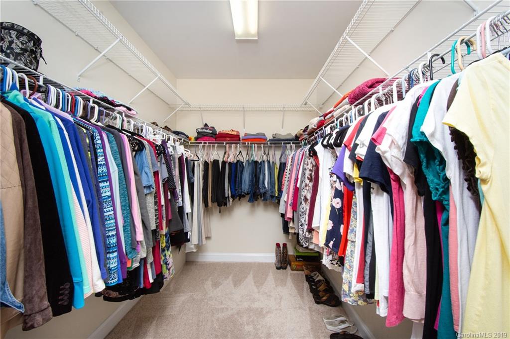538 Quicksilver Trail Fort Mill, SC 29708 - Photo 22 of 39 a view of walk in closet with clothes
