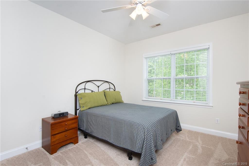 538 Quicksilver Trail Fort Mill, SC 29708 - Photo 27 of 39 a bedroom with a bed and a window