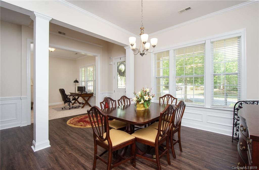 538 Quicksilver Trail Fort Mill, SC 29708 - Photo 4 of 39 a view of a dining room with furniture window and wooden floor