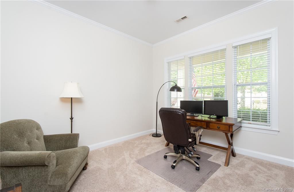 538 Quicksilver Trail Fort Mill, SC 29708 - Photo 5 of 39 a view of a livingroom with workspace and a window
