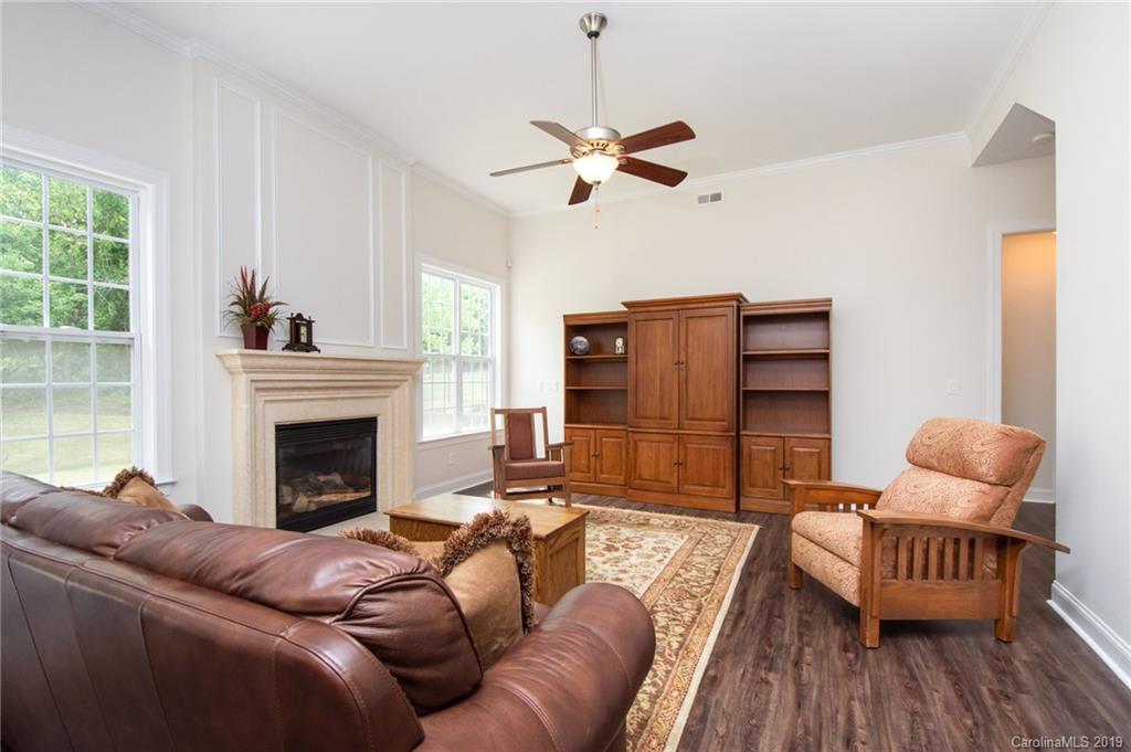 538 Quicksilver Trail Fort Mill, SC 29708 - Photo 7 of 39 a living room with furniture and a fireplace