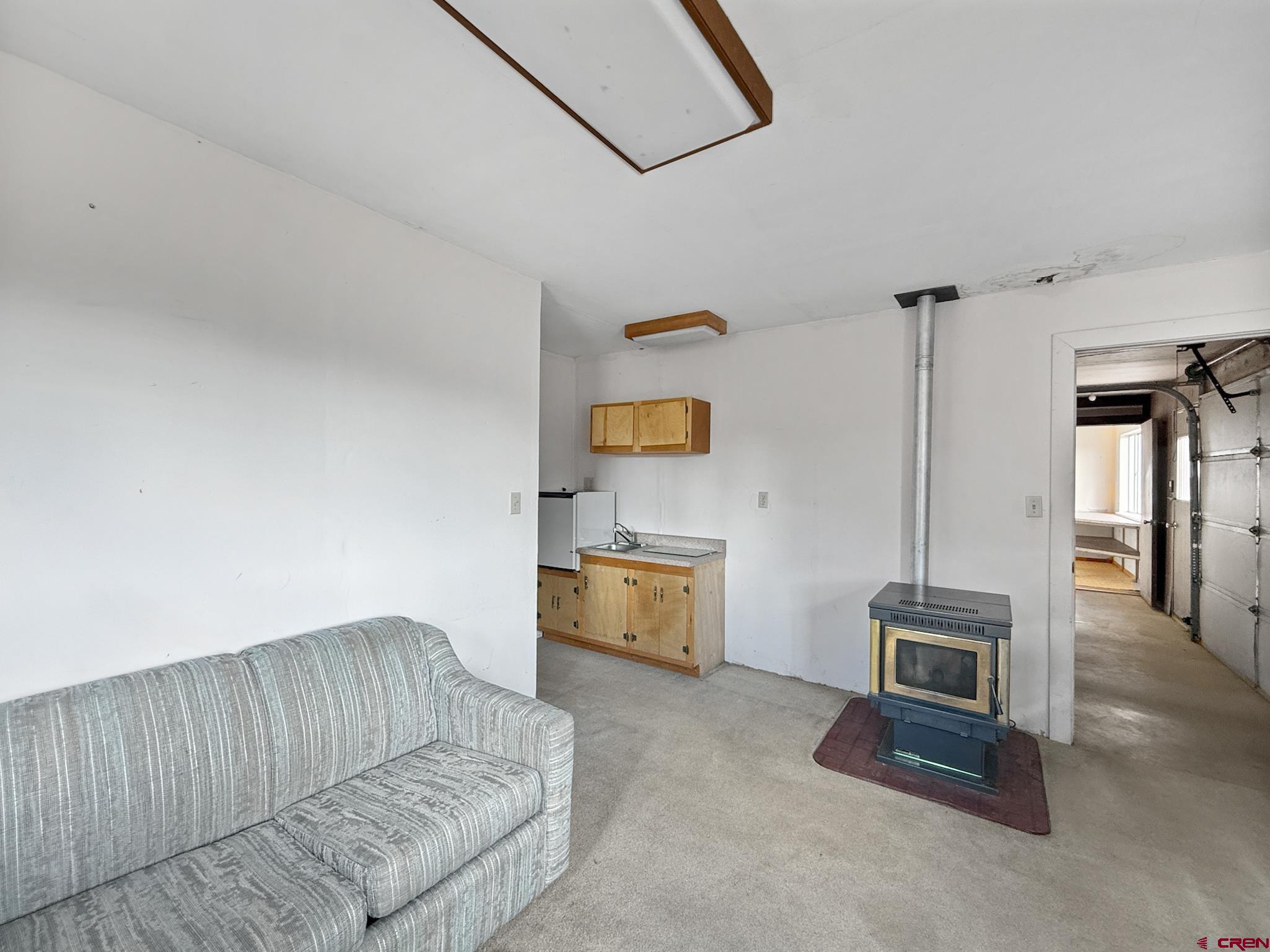 34706 Fruitland Mesa Road Crawford, CO 81415 - Photo 29 of 45 a living room with furniture and a wooden floor
