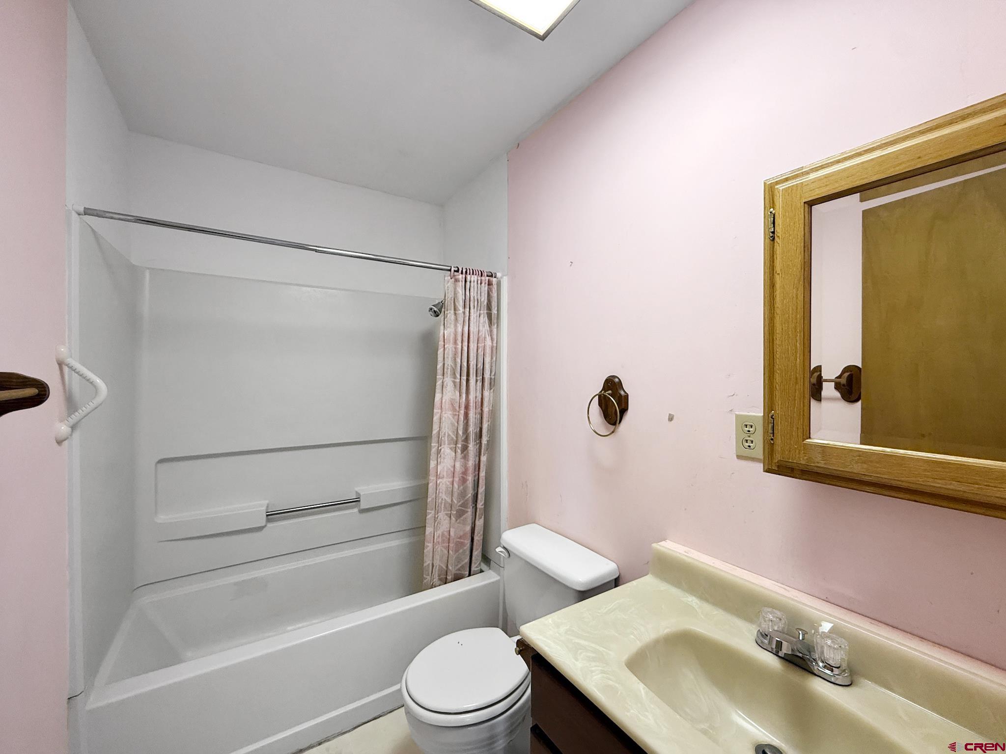 34706 Fruitland Mesa Road Crawford, CO 81415 - Photo 32 of 45 a bathroom with a sink toilet and shower