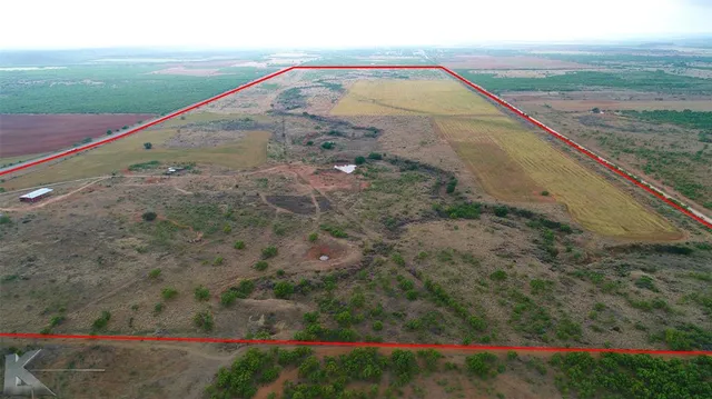 a view of a road with an outdoor space