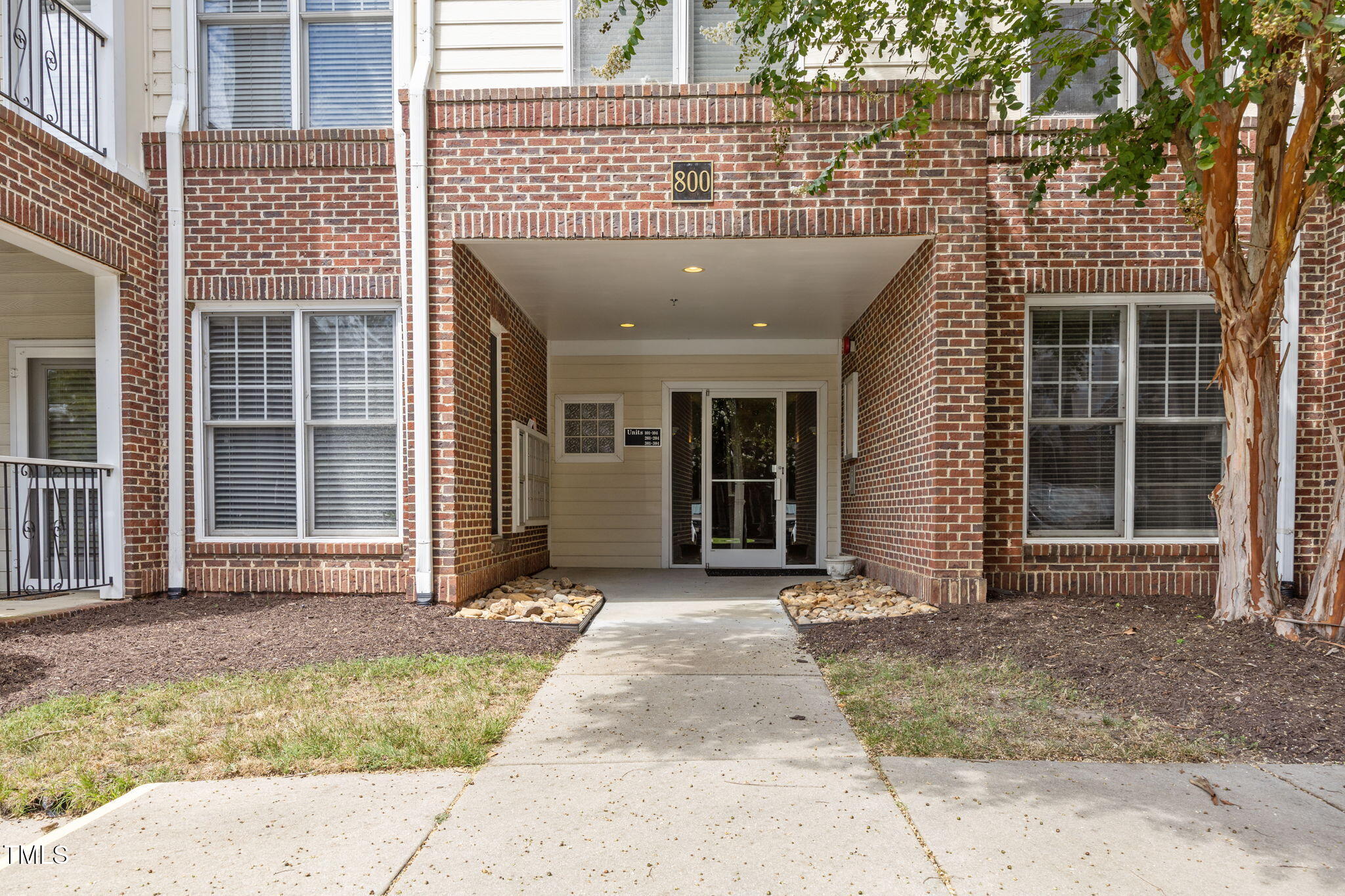 a front view of a house having yard