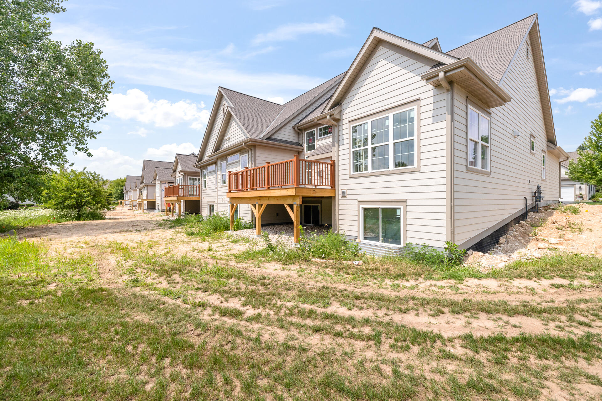 1797 Cedar Ridge Drive, Unit 2152 Slinger, WI 53086 - Photo 2 of 39 8-Exterior_1797 Cedar Ridge