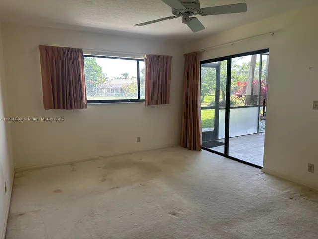 a bathroom with a sink and cabinets