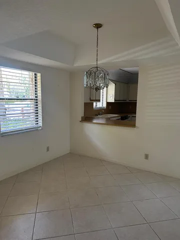 a buildings with trees in front of it