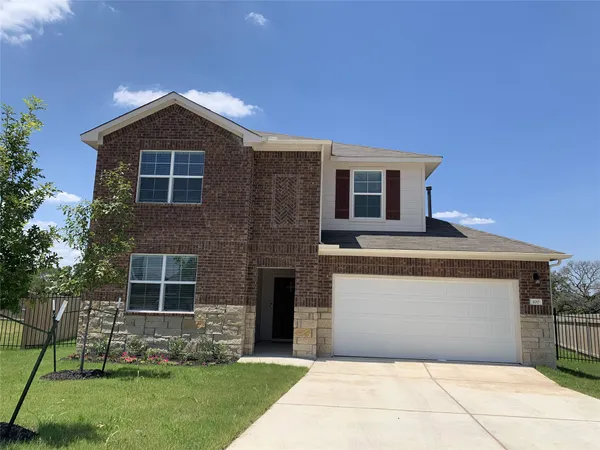 a front view of house with yard