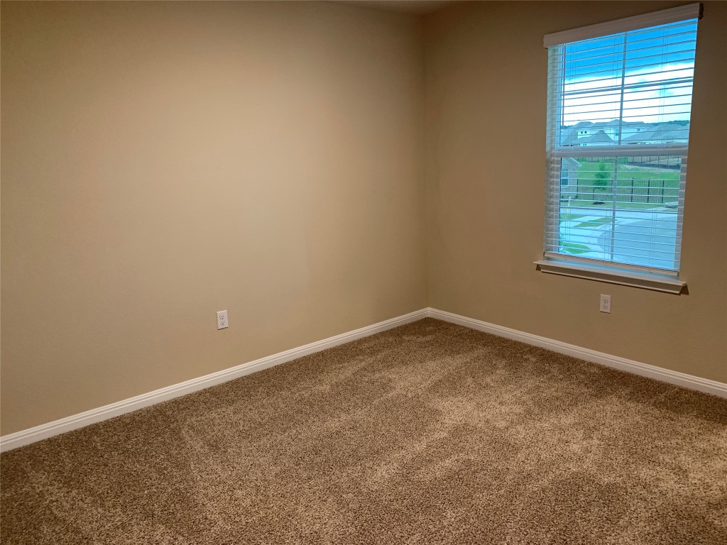 100 Royal Palm Way Leander, TX 78641 - Photo 20 of 29 an empty room with a window
