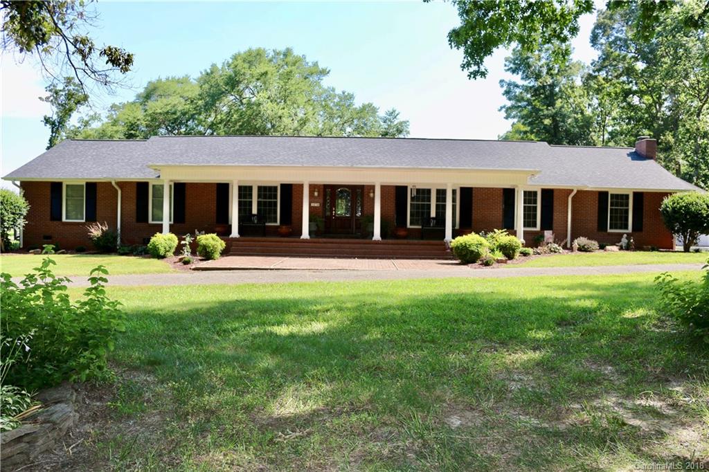 1274 Blacksnake Road Stanley, NC 28164 - Photo 2 of 34 front view of a house with a yard