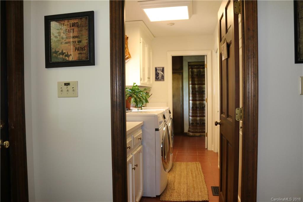 1274 Blacksnake Road Stanley, NC 28164 - Photo 18 of 34 a view of a hallway view with wooden floor and staircase