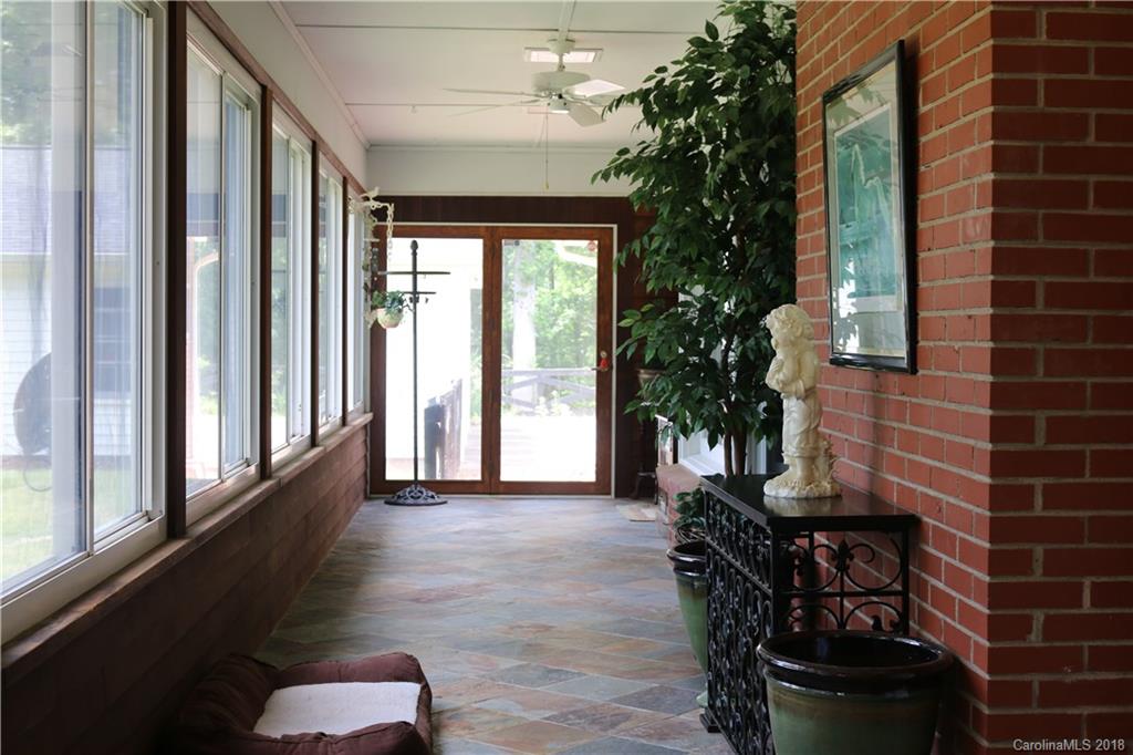 1274 Blacksnake Road Stanley, NC 28164 - Photo 19 of 34 a view of a porch with seating space