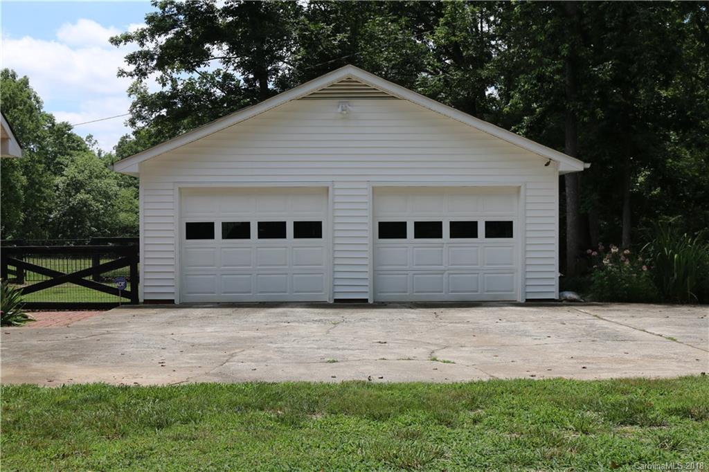 1274 Blacksnake Road Stanley, NC 28164 - Photo 30 of 34 a view of a house with yard